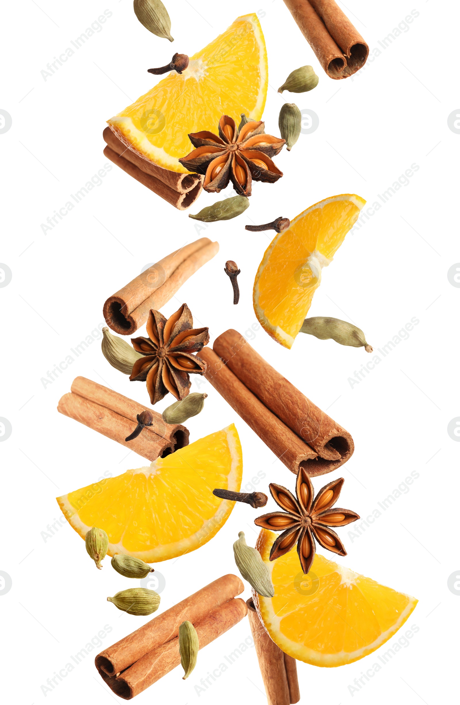 Image of Pieces of fresh orange, aromatic anise stars, cinnamon, cloves and cardamom falling on white background. Vertical banner design