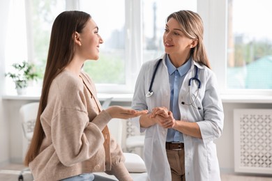 Professional doctor working with patient in hospital