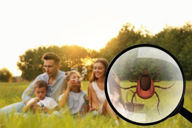 Image of Family spending time together in park and don't even suspect about hidden danger in green grass. Illustration of magnifying glass with tick, selective focus
