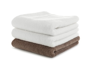 Photo of Stack of clean soft towels on white background