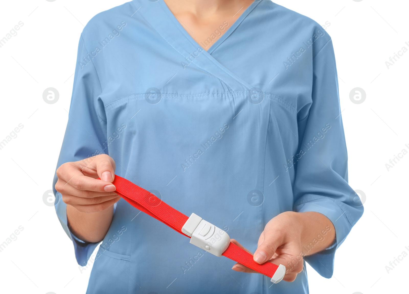 Photo of Female doctor holding tourniquet on white background, closeup. Medical object