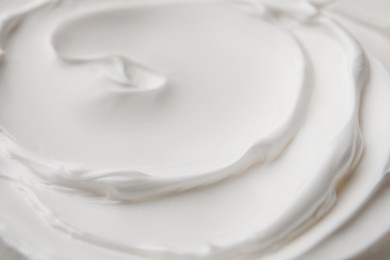 Texture of white face cream as background, closeup