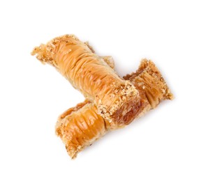 Photo of Eastern sweets. Pieces of tasty baklava isolated on white, top view