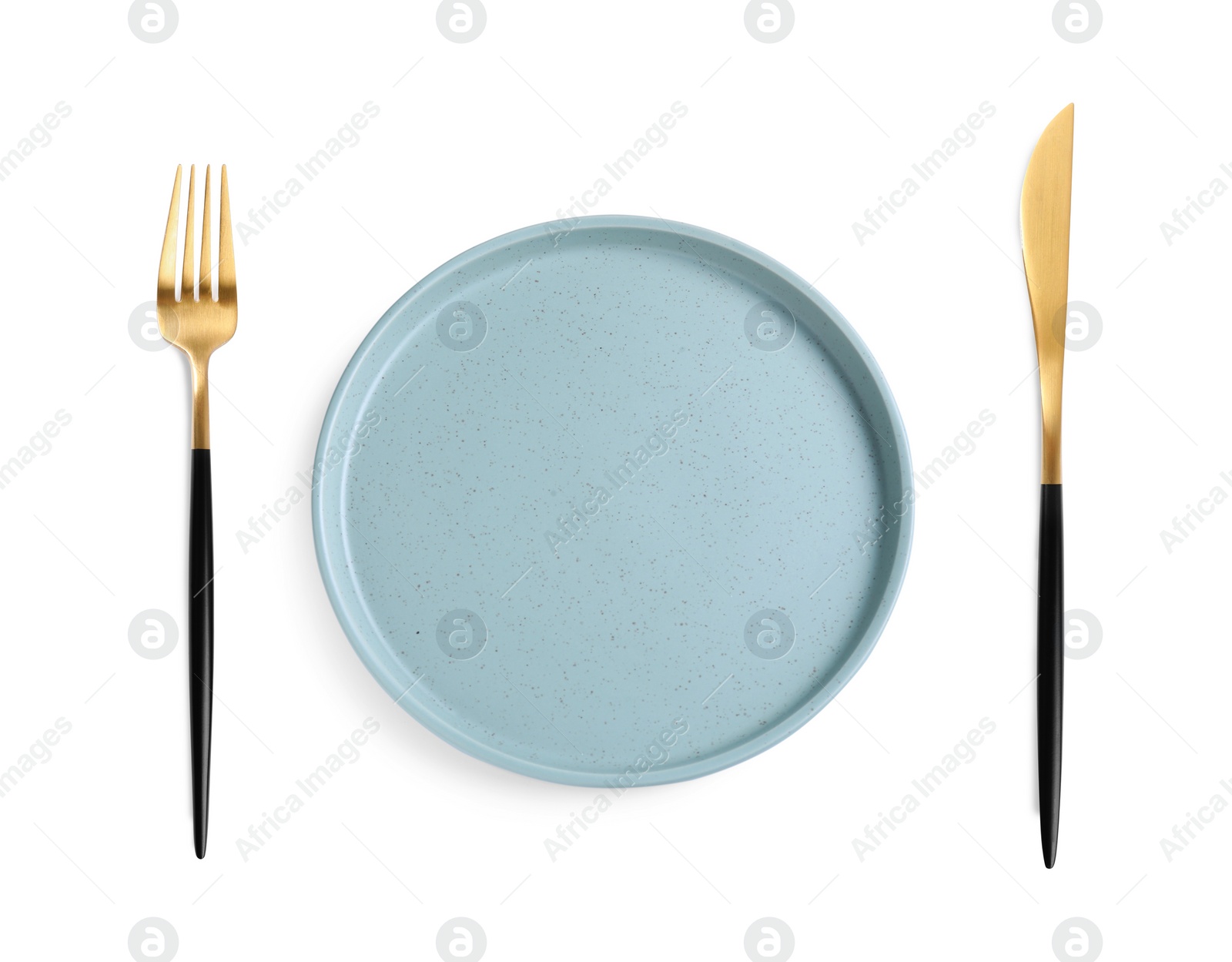 Image of Empty plate with golden fork and knife on white background, top view