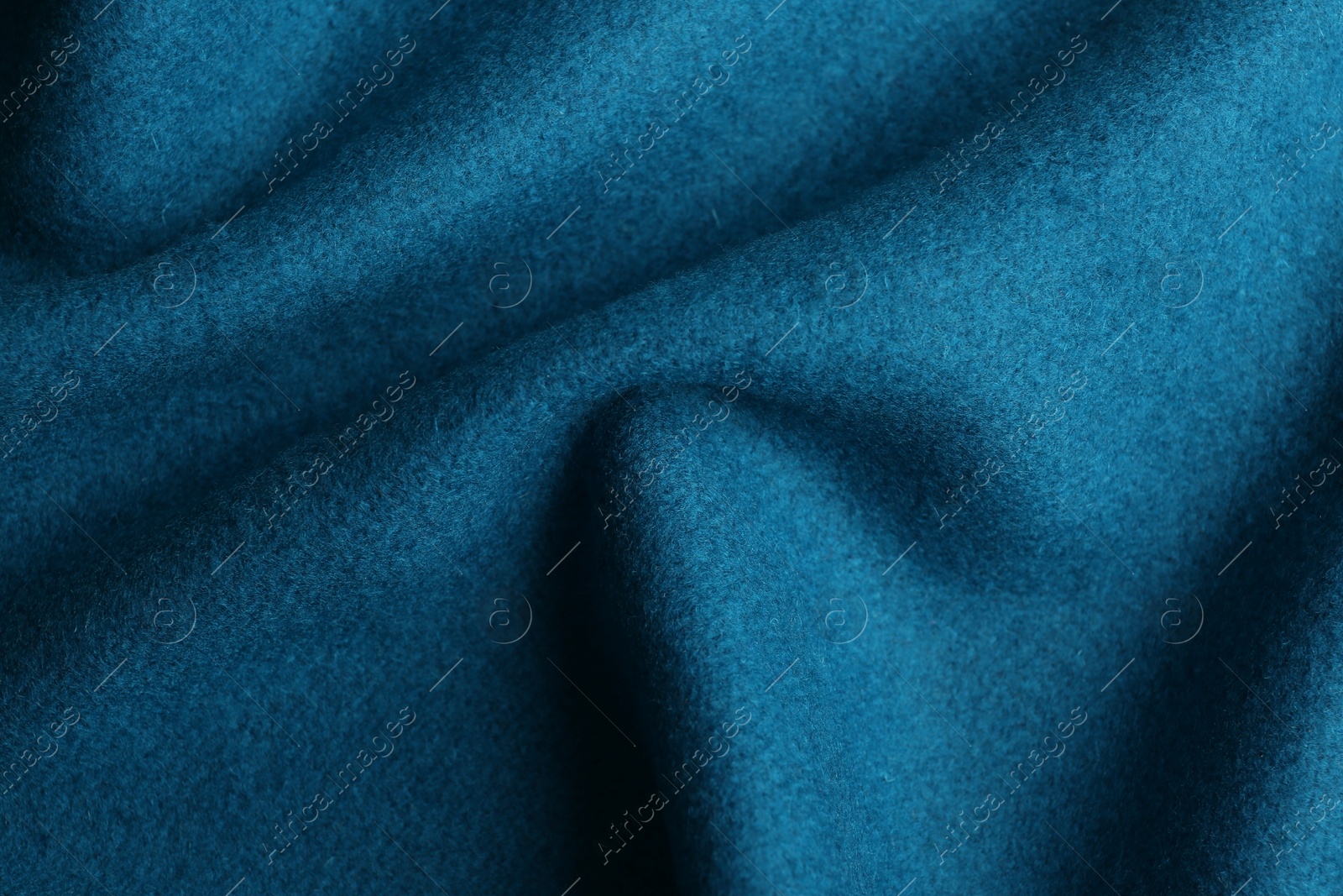 Photo of Texture of beautiful blue fabric as background, closeup