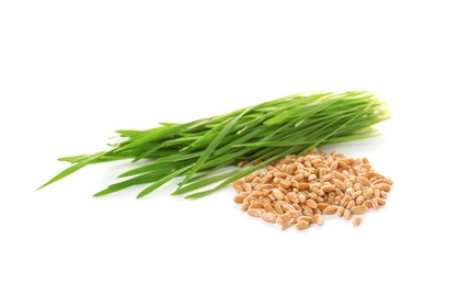 Photo of Wheat grass and seeds on white background