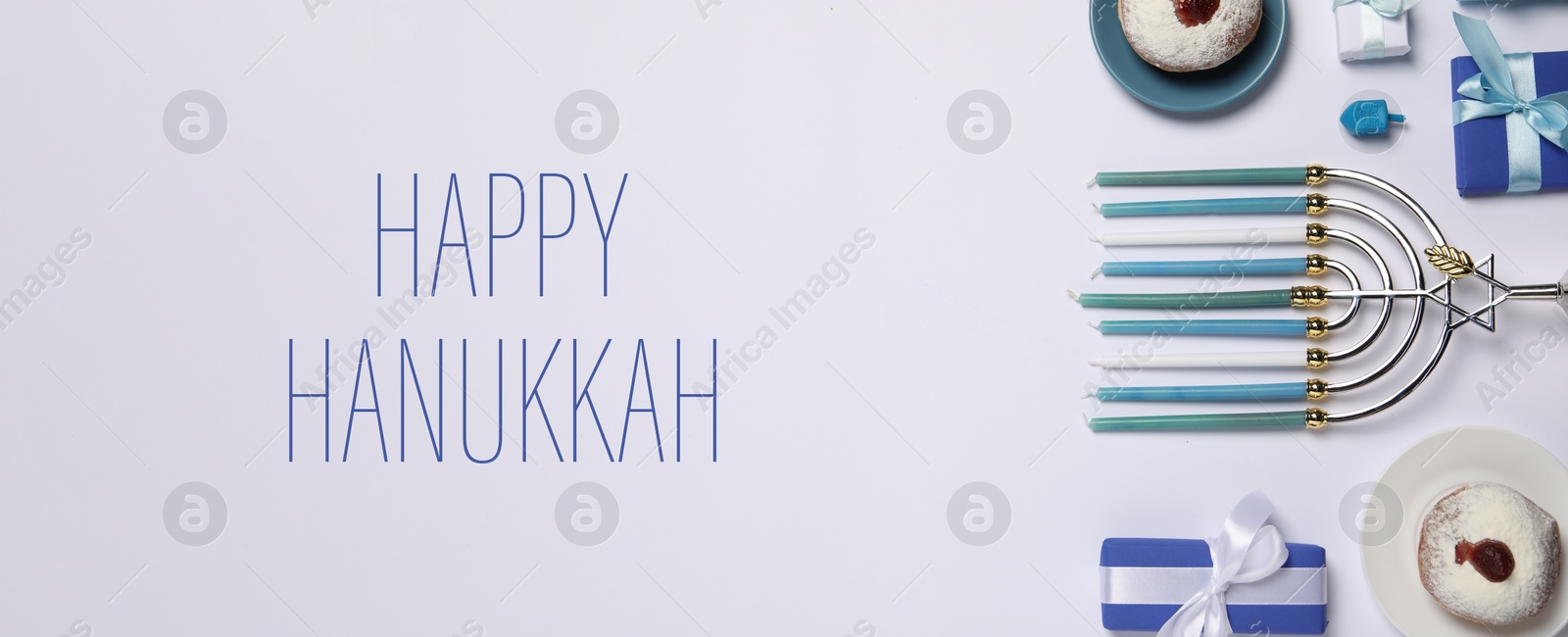 Image of Happy Hanukkah. Menorah, donuts, dreidel and gifts on light background, flat lay. Banner design