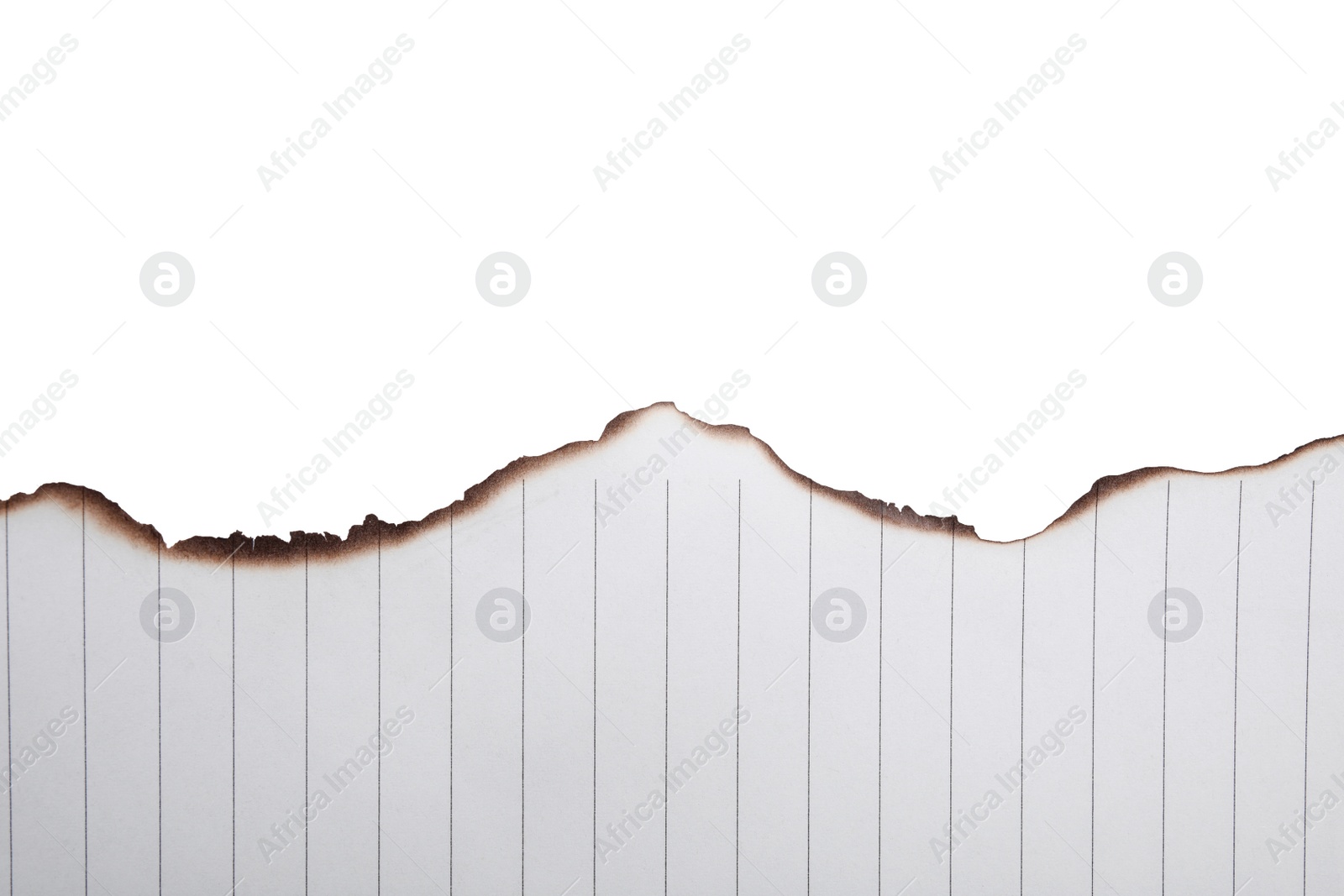Photo of Piece of paper with dark burnt borders isolated on white, top view. Space for text