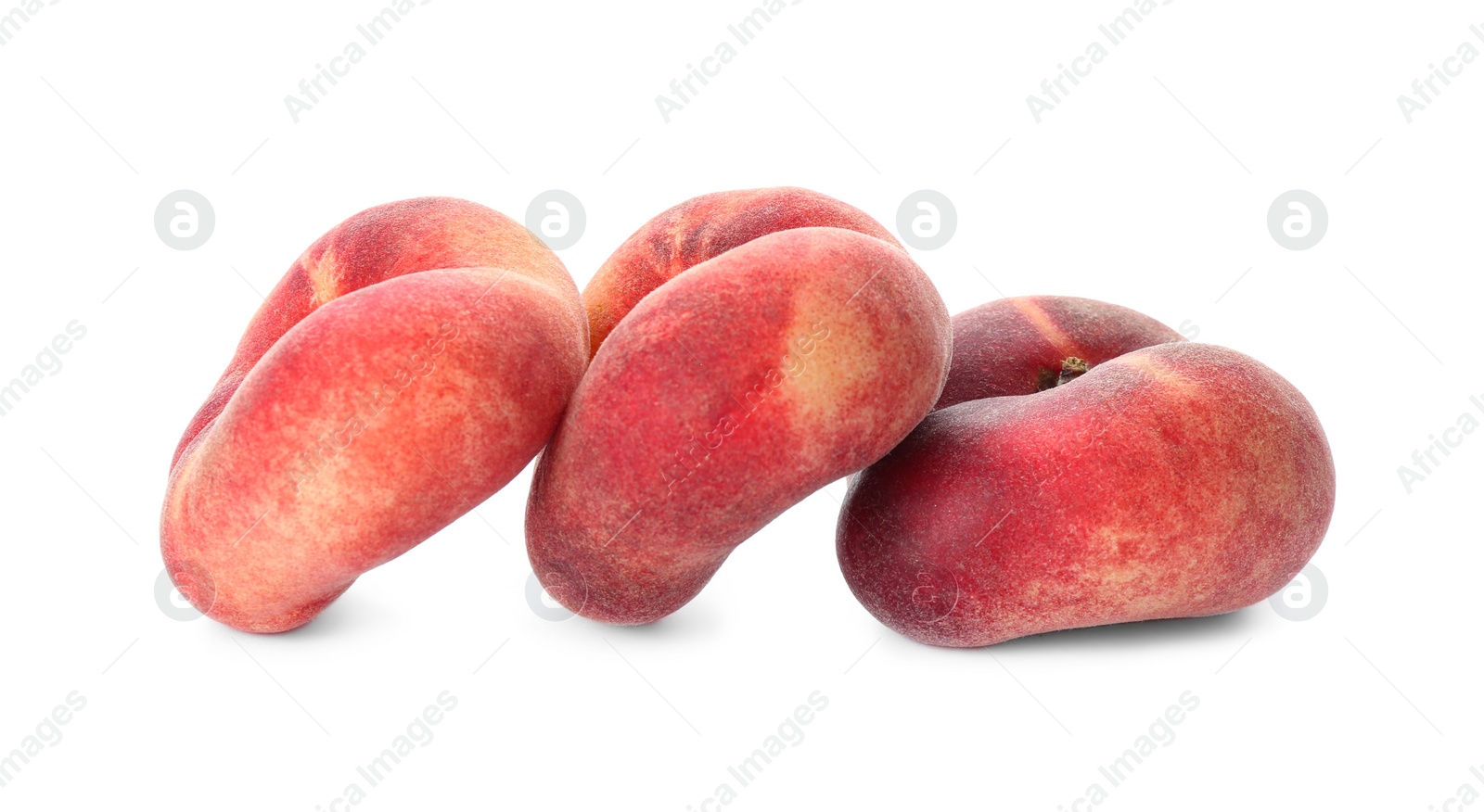 Photo of Fresh ripe donut peaches on white background