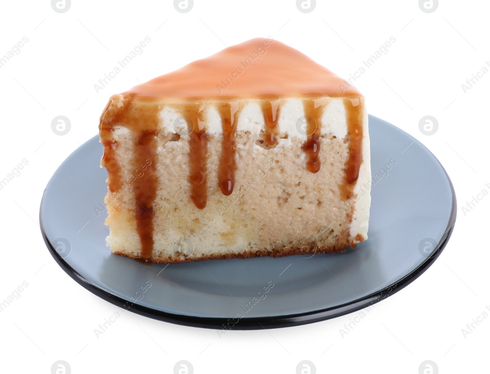 Photo of Slice of delicious cake with caramel sauce isolated on white