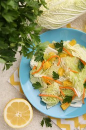 Tasty salad with Chinese cabbage and products on beige table, flat lay