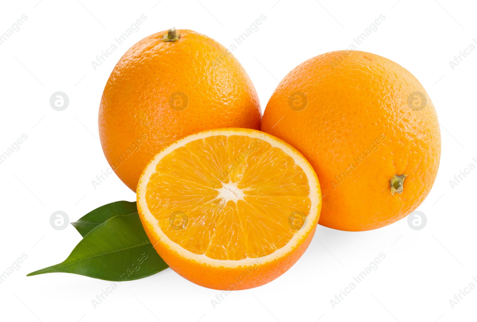 Photo of Whole and cut ripe oranges isolated on white