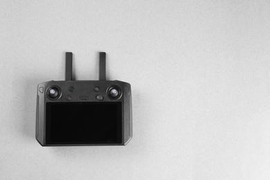 Photo of New modern drone controller on white background, top view