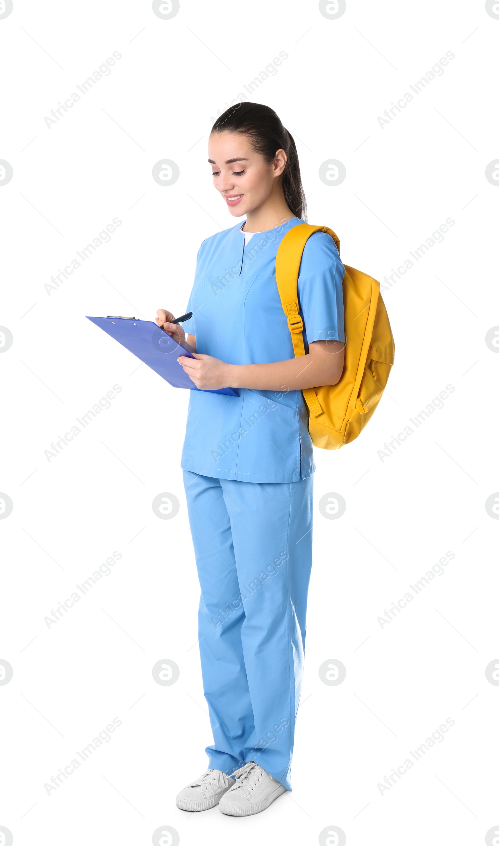 Photo of Young medical student with clipboard and backpack on white background