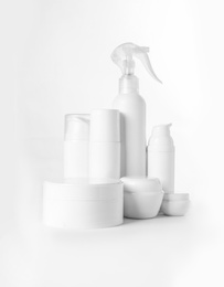 Photo of Different body care products on white background