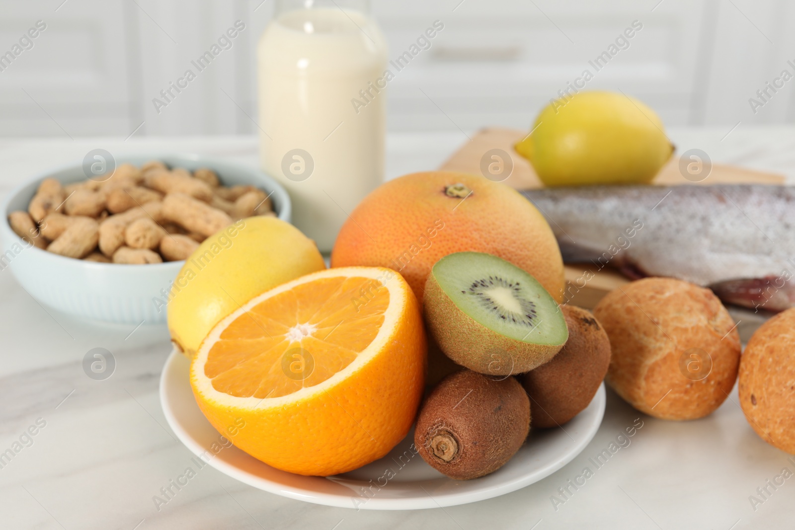 Photo of Allergenic food. Different fresh products on light table, closeup