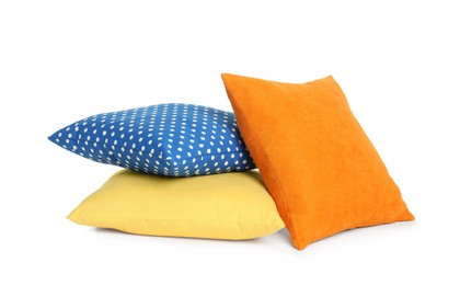 Different colorful decorative pillows on white background