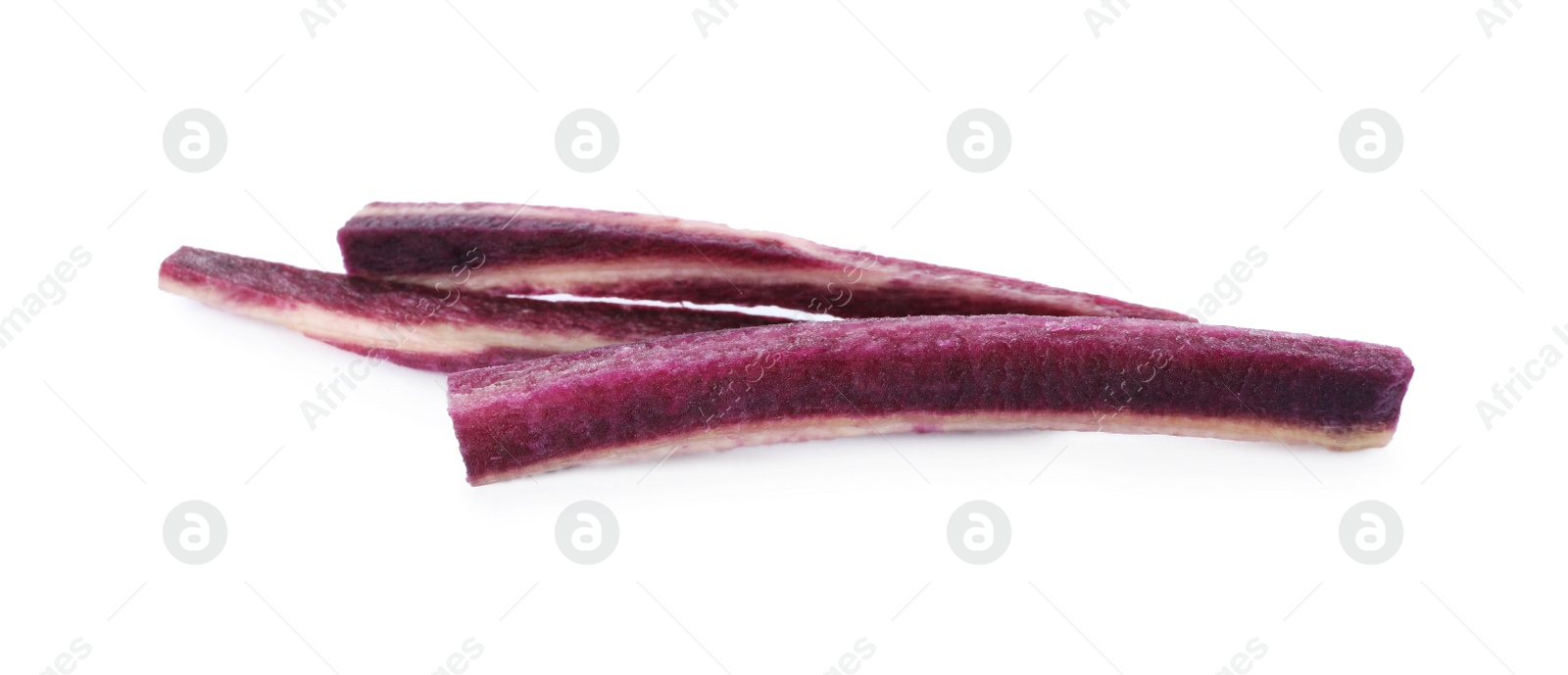 Photo of Raw purple carrot sticks isolated on white