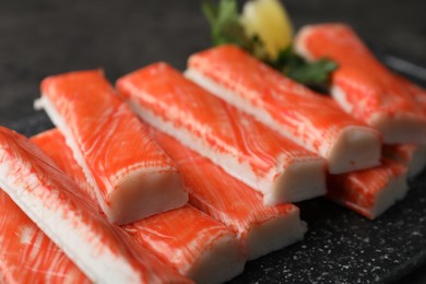 Fresh crab sticks on table, closeup view