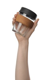 Woman holding glass cup on white background, closeup. Conscious consumption