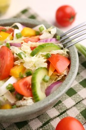 Photo of Tasty salad with Chinese cabbage in bowl on table, closeup