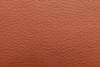 Texture of brown leather as background, closeup