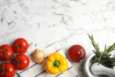 Photo of Flat lay composition with ingredients for cooking on white marble table. Space for text