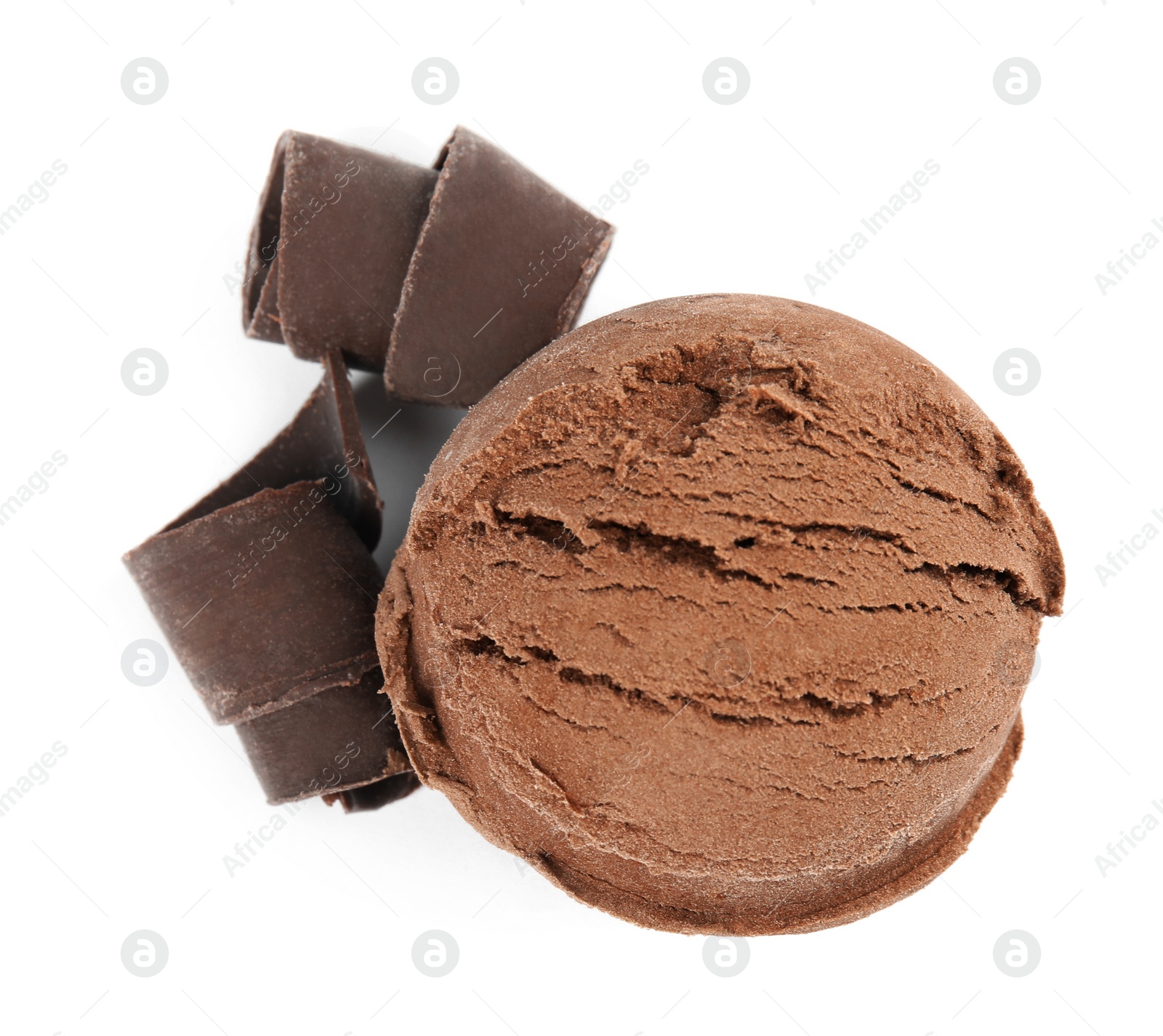Photo of Scoop of ice cream and chocolate curls isolated on white, top view