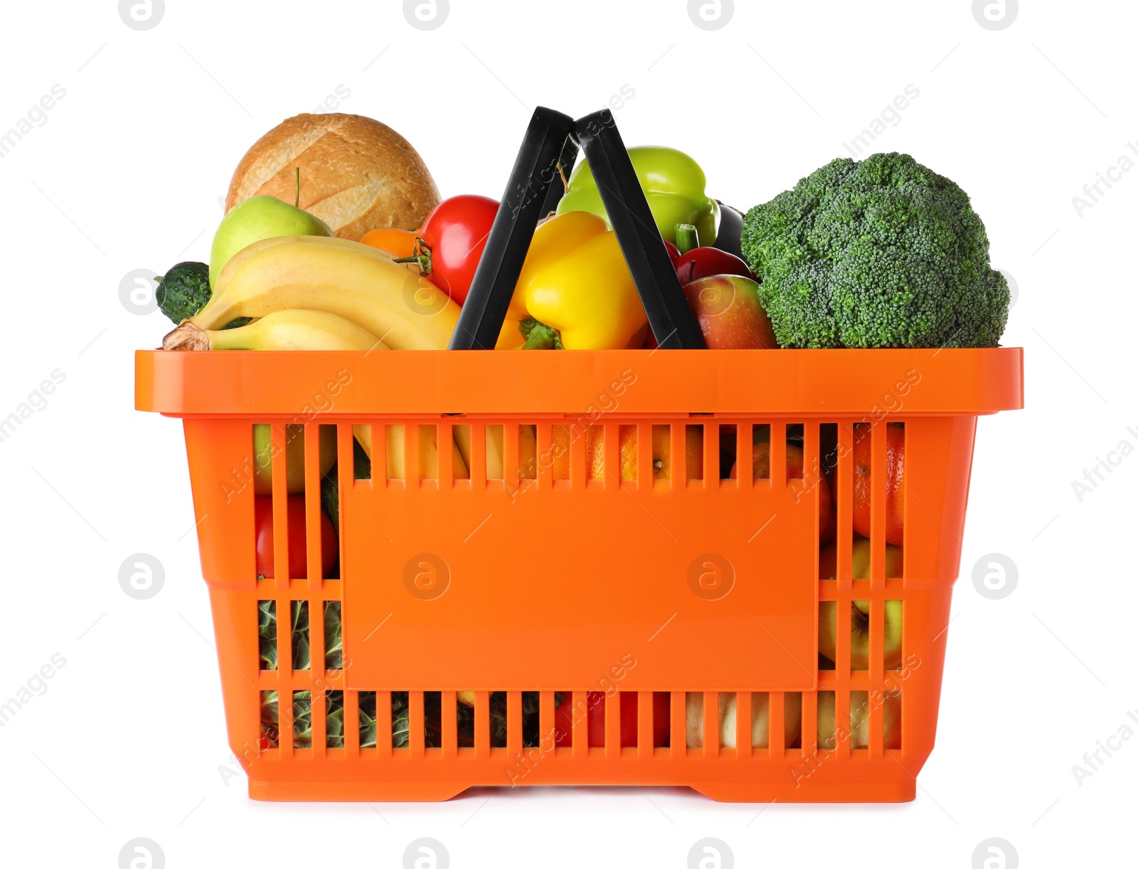 Photo of Shopping basket with grocery products on white background