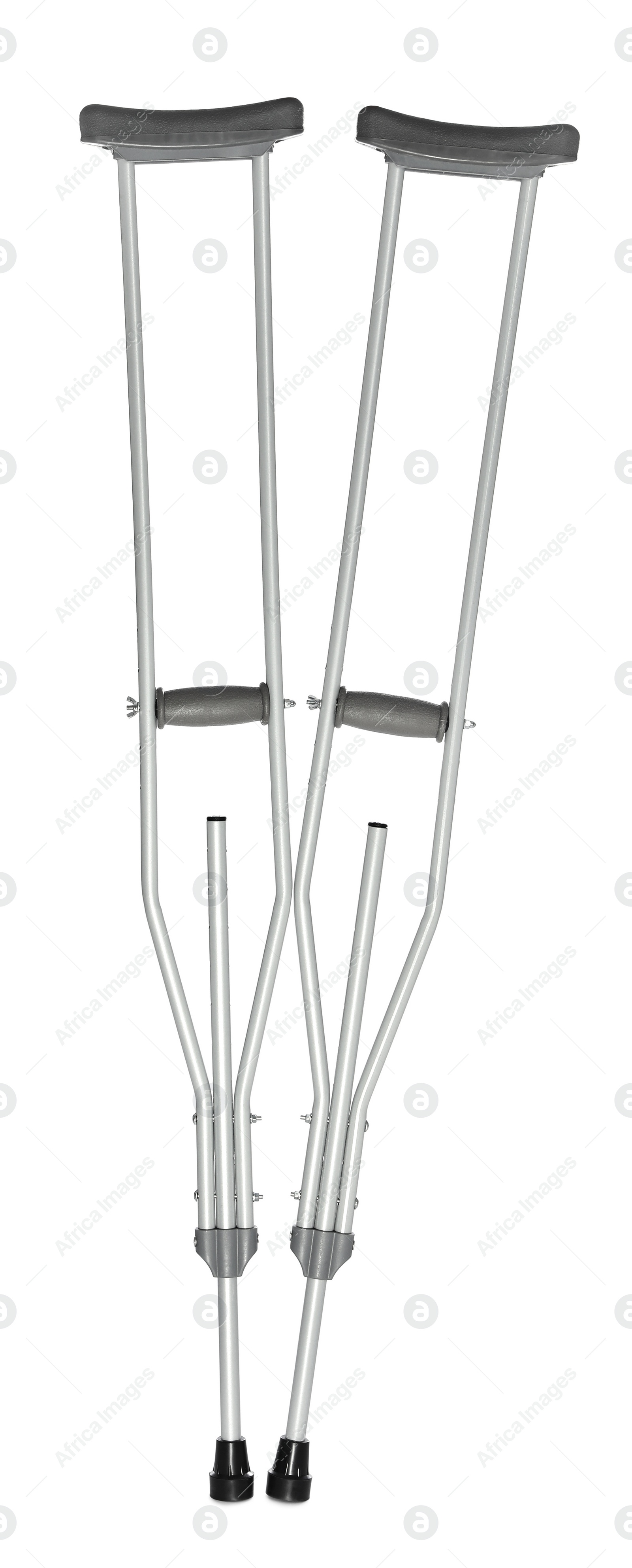 Photo of Pair of axillary crutches on white background