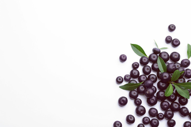 Fresh acai berries on white background, top view