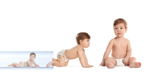 Little baby getting out of test tube on white background