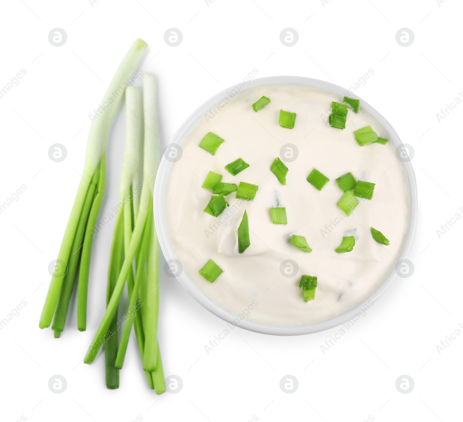 Photo of Fresh sour cream with onion on white background, top view