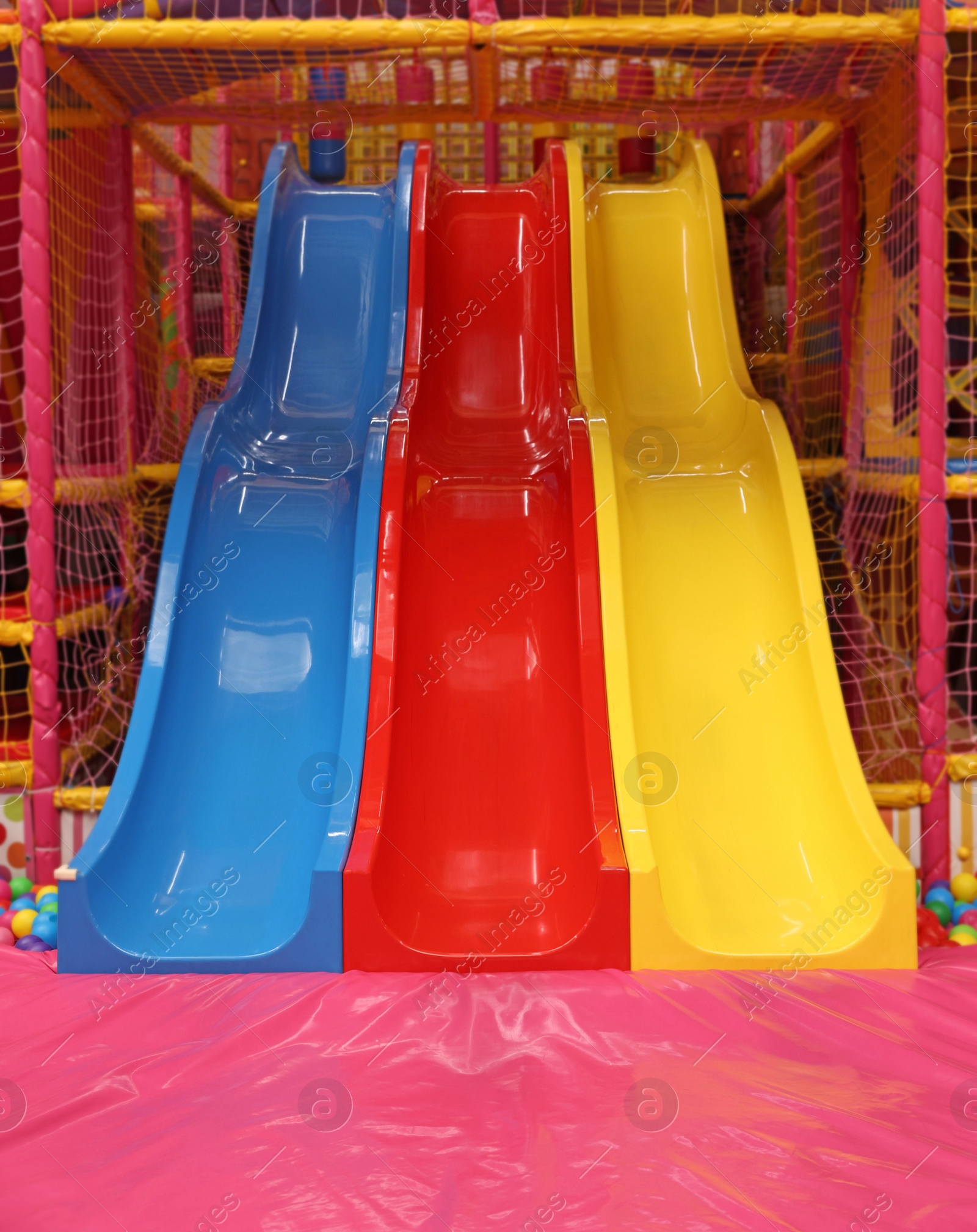 Photo of Slides and many colorful balls in ball pit