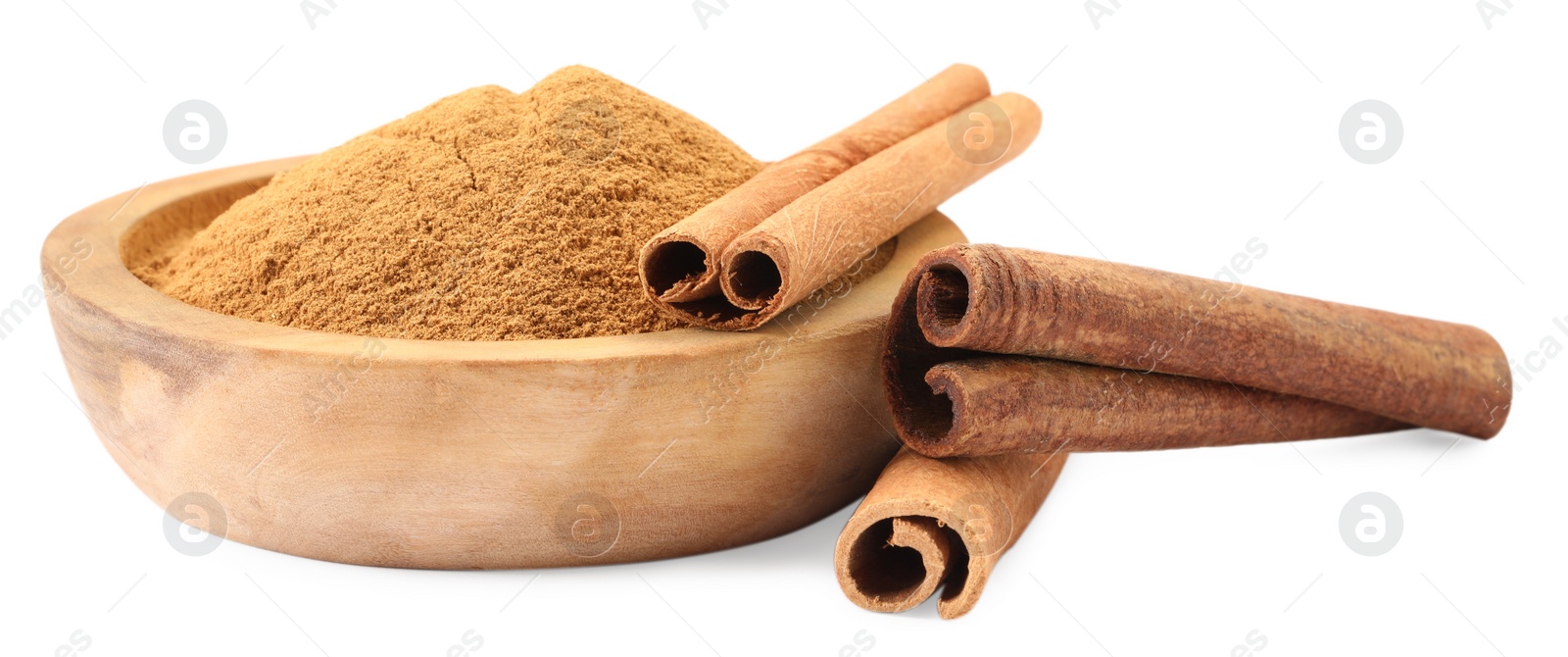 Photo of Dry aromatic cinnamon sticks and powder isolated on white