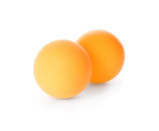 Photo of Orange ping pong balls isolated on white