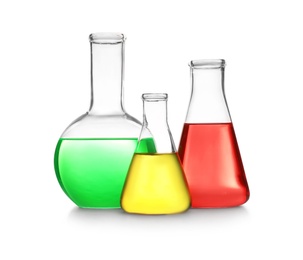 Photo of Laboratory glassware with different samples on white background. Solution chemistry