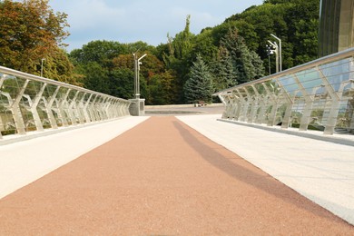 Photo of Modern bridge with bike lane over river