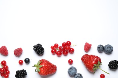 Photo of Mix of fresh berries on white background, flat lay