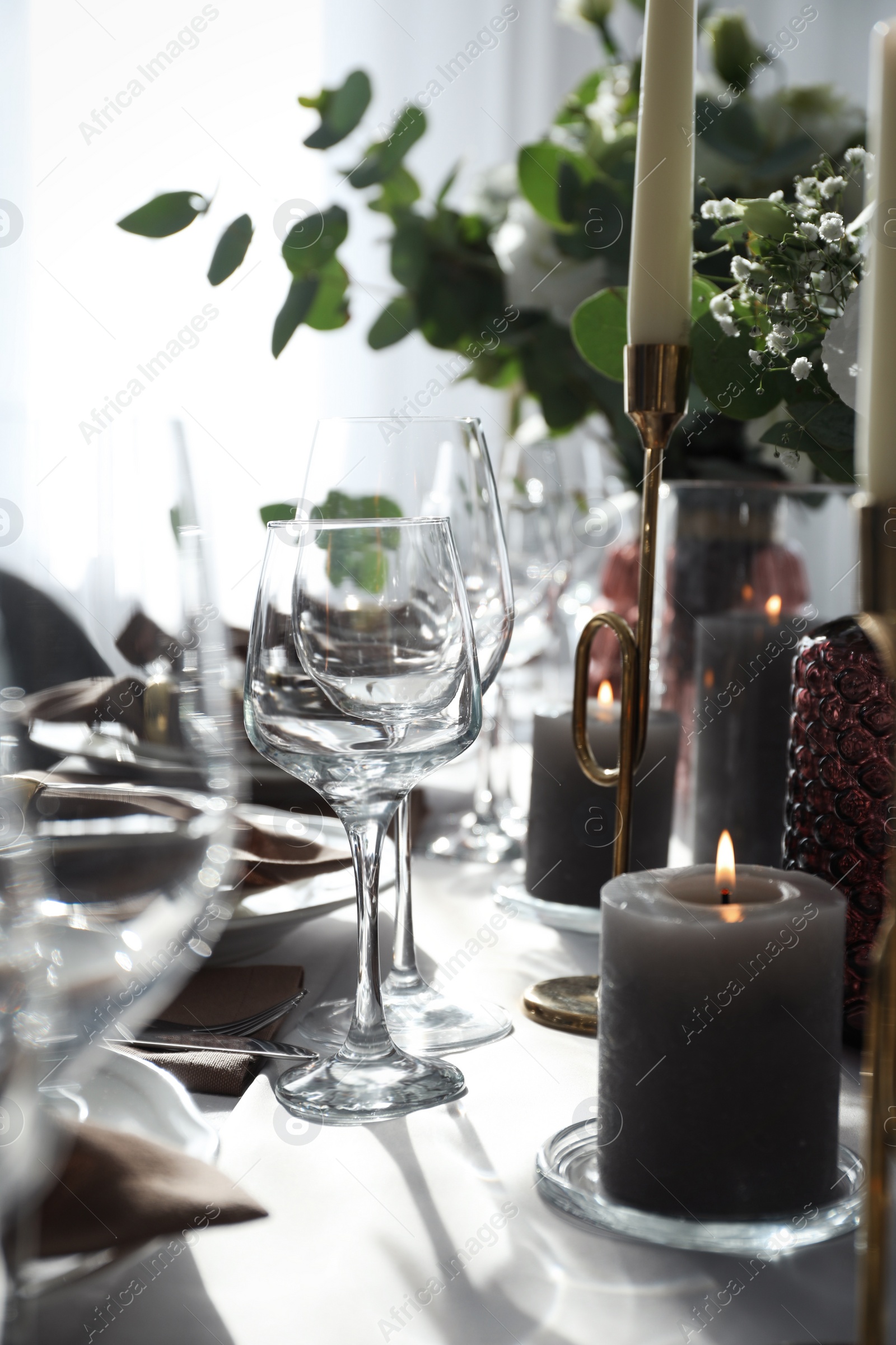 Photo of Festive table setting with beautiful decor indoors