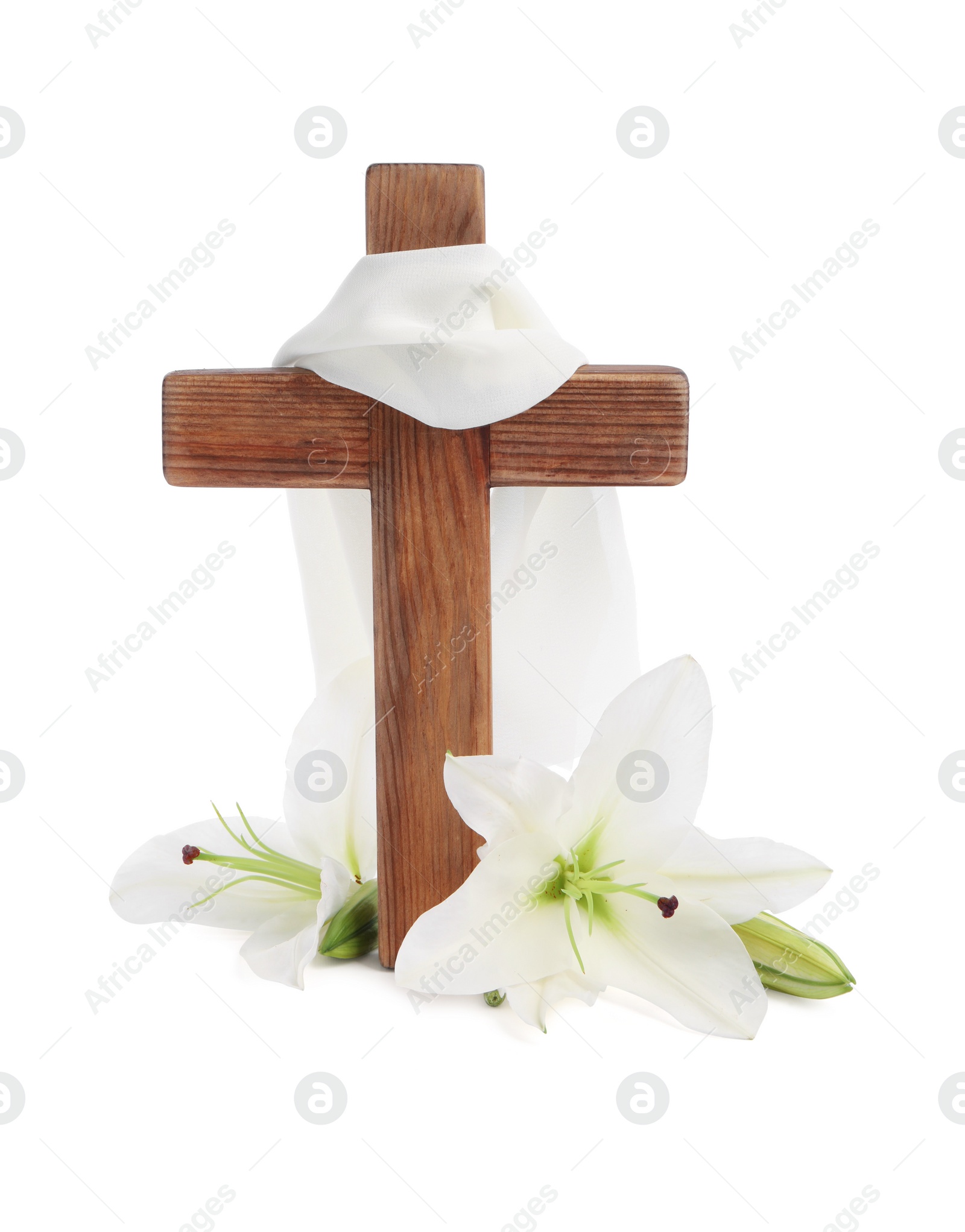 Photo of Wooden cross, cloth and lily flowers on white background. Easter attributes