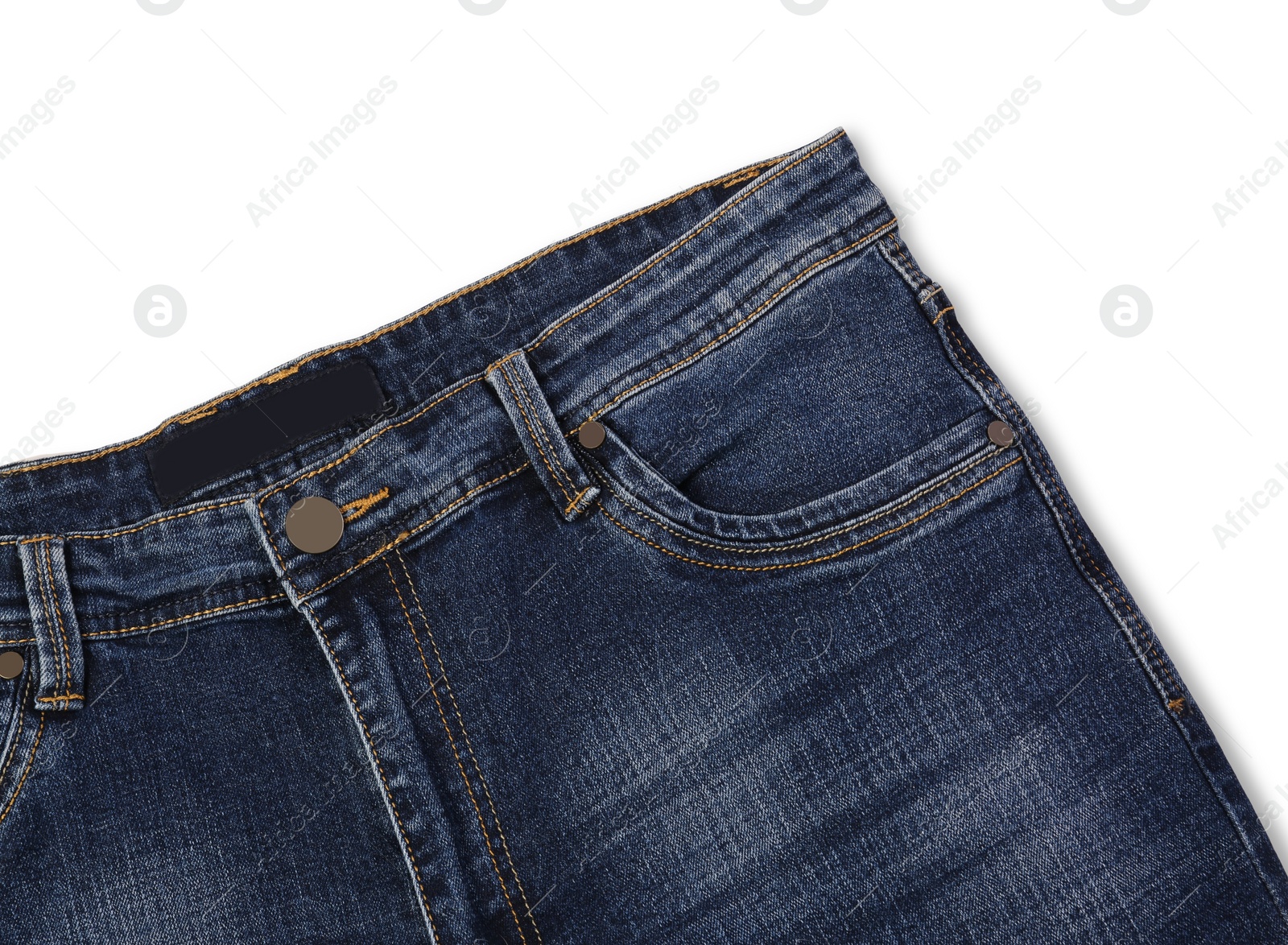 Photo of Stylish dark blue jeans isolated on white, top view