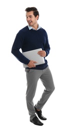Young male teacher with laptop on white background
