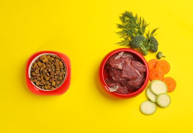 Pet food and natural ingredients on yellow background, flat lay