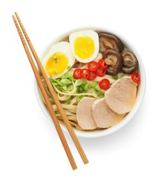 Photo of Delicious ramen with meat in bowl and chopsticks isolated on white, top view. Noodle soup