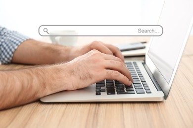 Search bar of website and man working with modern laptop indoors, closeup