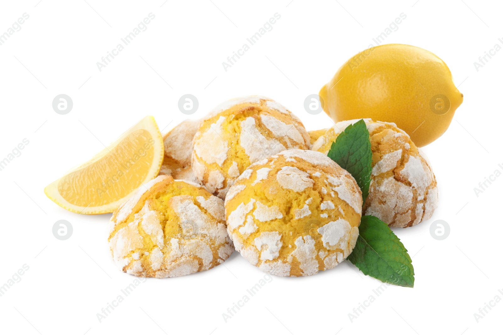 Photo of Tasty homemade lemon cookies, mint and fresh fruits on white background