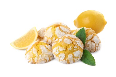 Tasty homemade lemon cookies, mint and fresh fruits on white background