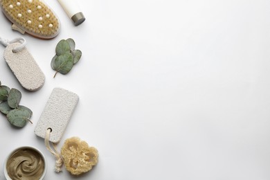Photo of Flat lay composition with pumice stones on light background. Space for text