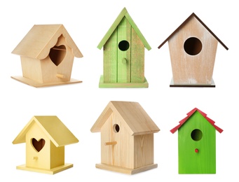 Image of Set with different beautiful bird houses on white background